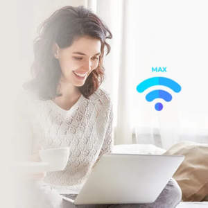 Person working on laptop experiencing slow wifi in certain areas